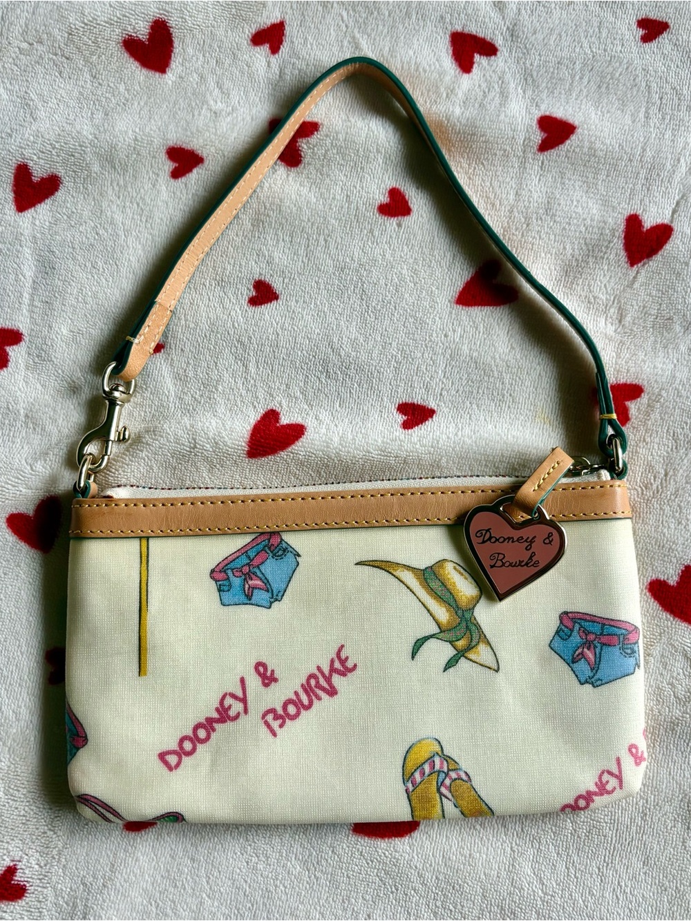 Dooney & Bourke Cream Printed Wristlet with Tan Trim and Pink Accents